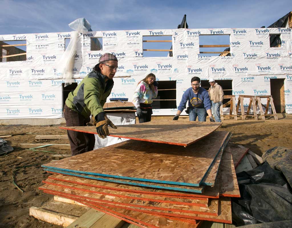 Multiple PTSEM students building new classroom