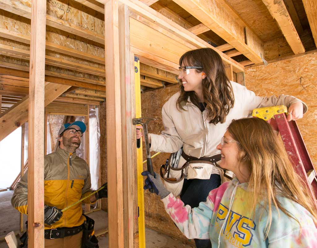 Students building new classrooms