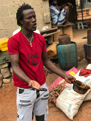 Ghanaian man with bowl