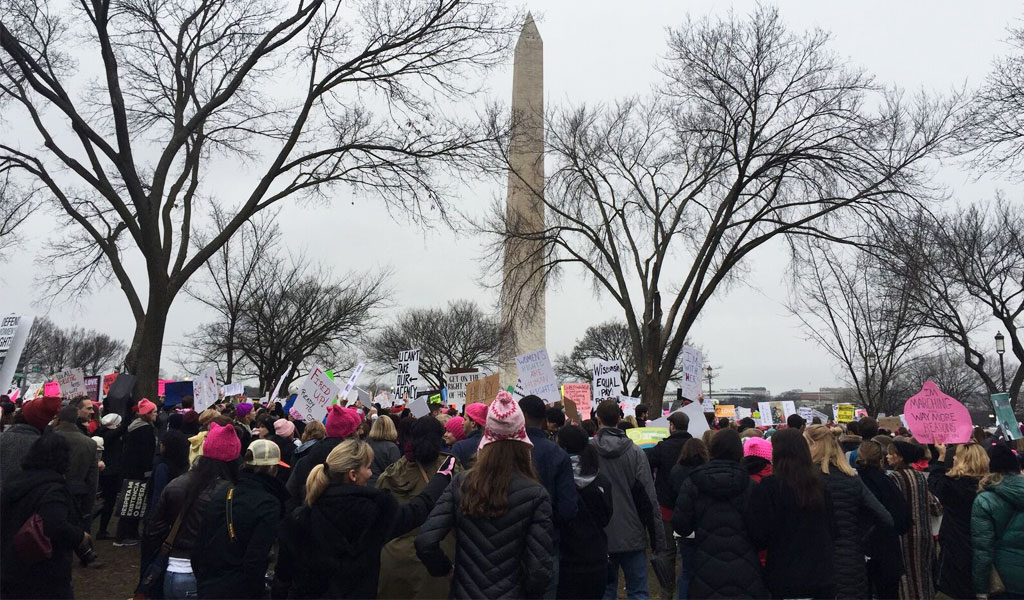 Wide shot of the Women's march in front of the Washington Monument