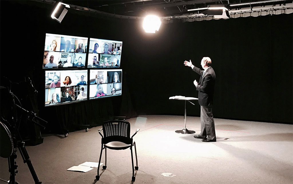 Professor Dennis Olson in the Live Experience! studio teaching our Certificate of Theology and Ministry online with students from around the world