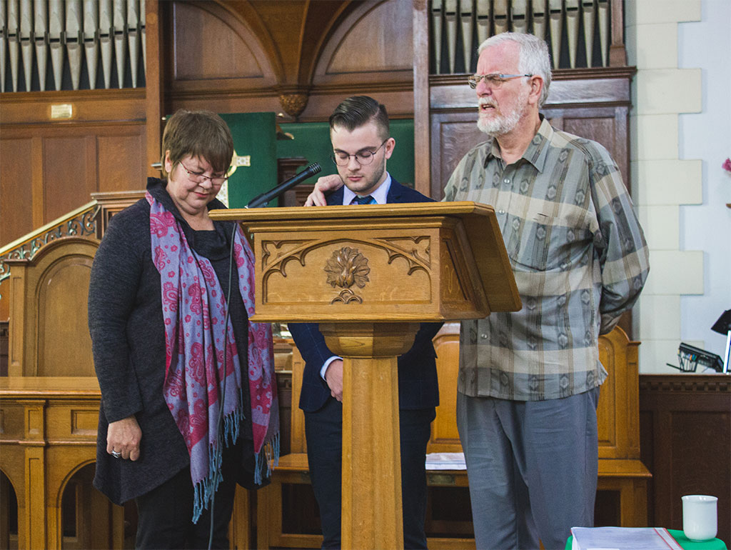 Thomas Dearduff praying in chapel