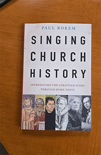 Book cover of Singing Church History.