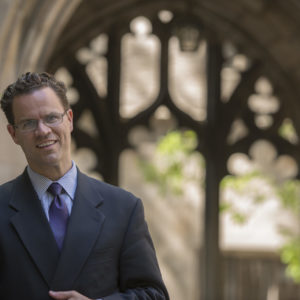 Kevin Hector, a Faculty Award for Excellence in Graduate Teaching and Mentoring in the Divinity School, outside Bond Chapel Monday, May 20, 2013, at the University of Chicago. (Photo by Robert Kozloff)