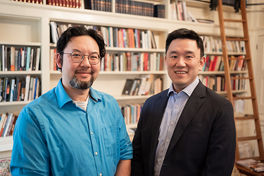 David Chao and Easten Law in front of books