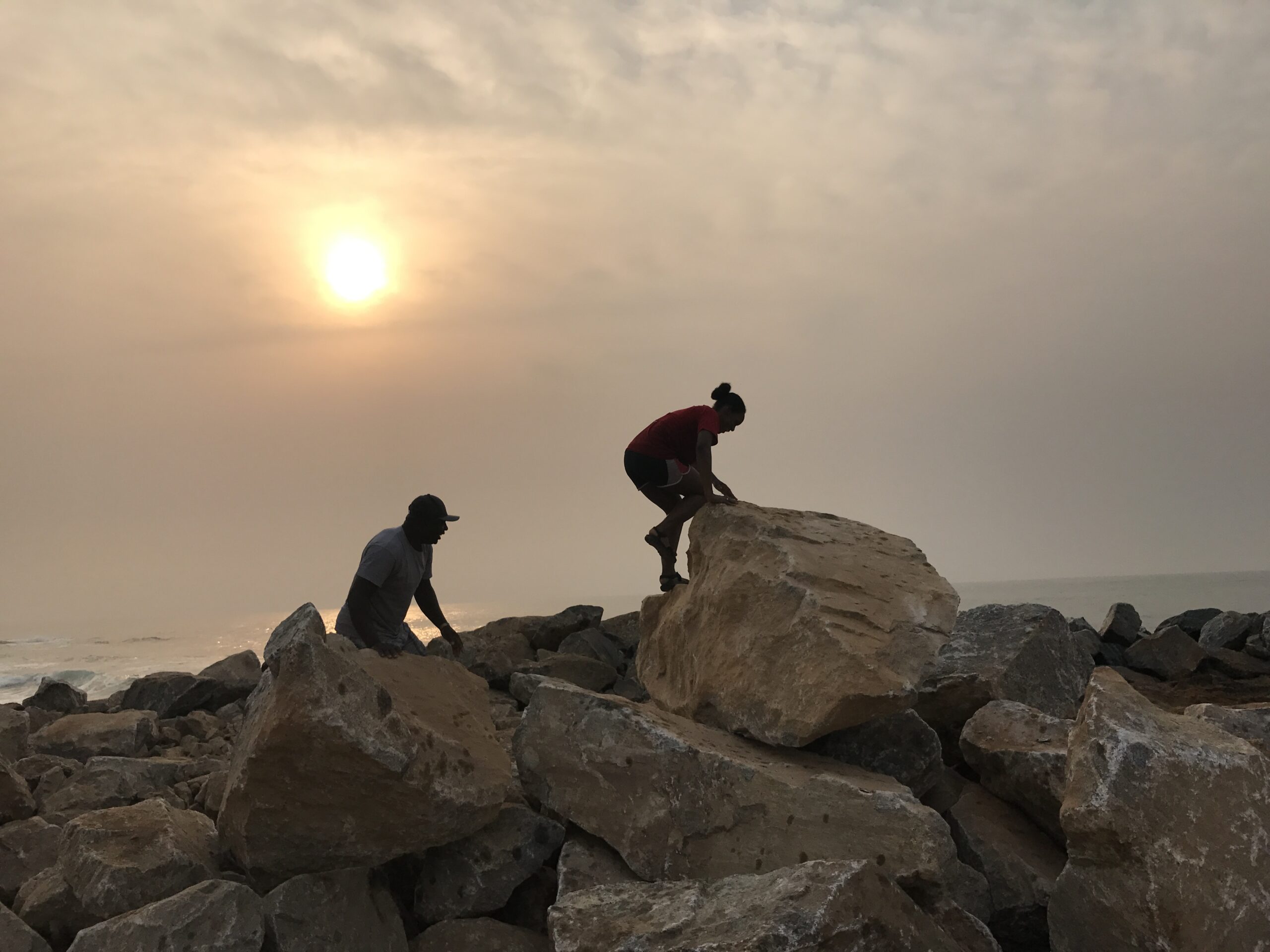 PTSEM Students on Rocks in the sunset