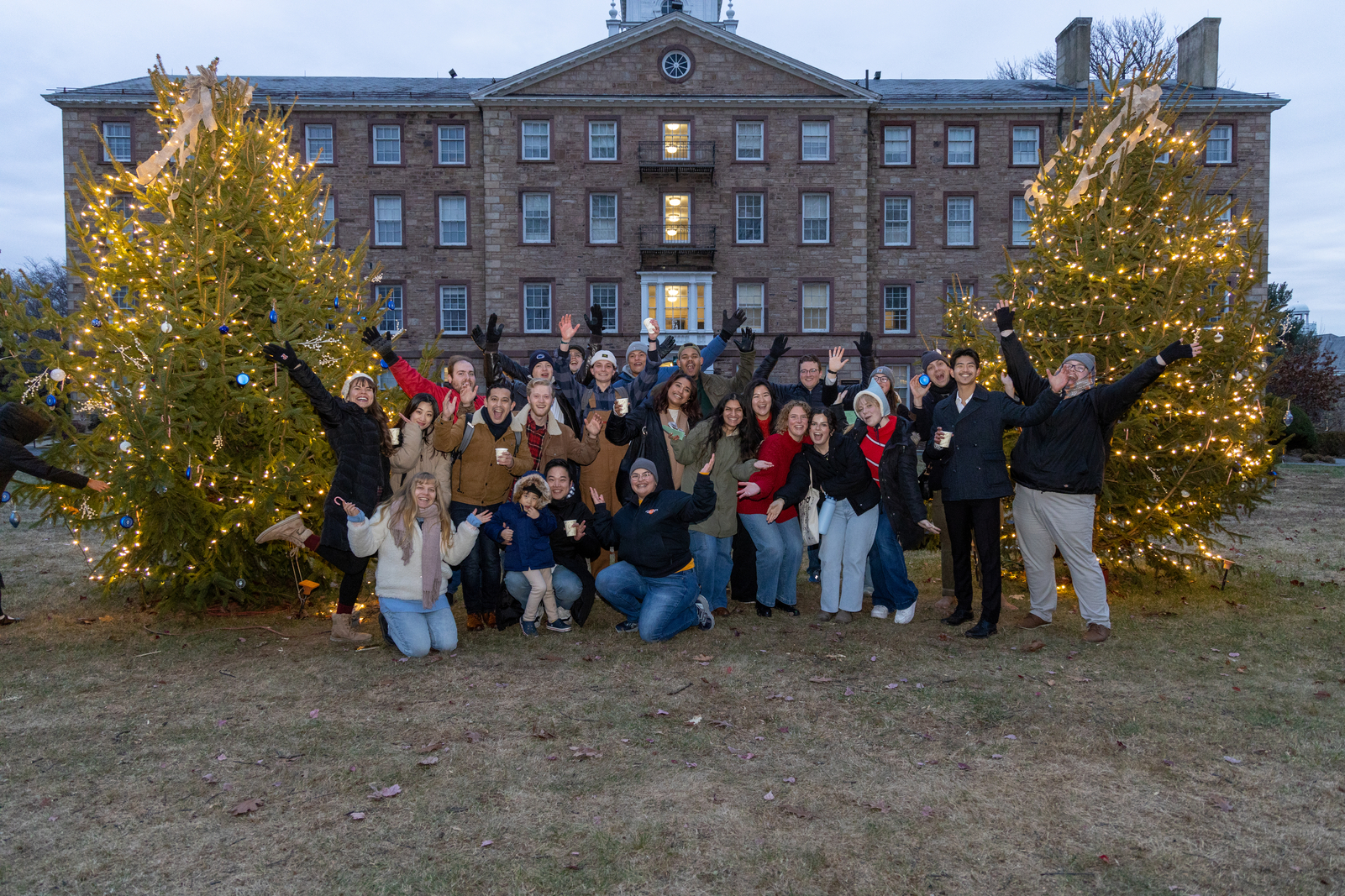 Students pose in front of Christmas tree on Princeton Theological Seminary Campus