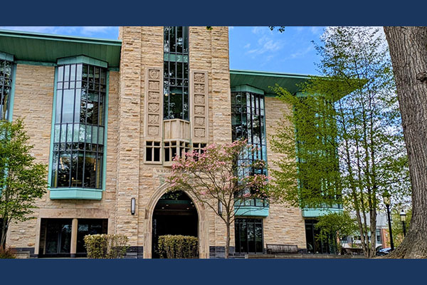 photo of the front of Wright Library Princeton Theological Seminary in spring
