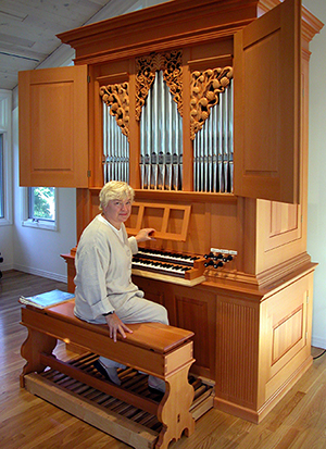 Joan Lippincott and her Fritts Opus 21 pipe organ